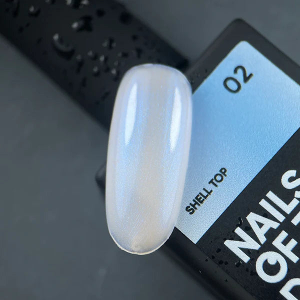 NAILSOFTHENIGHT Shell top 02 - top perlado con un toque azul sin capa pegajosa, 10 ml