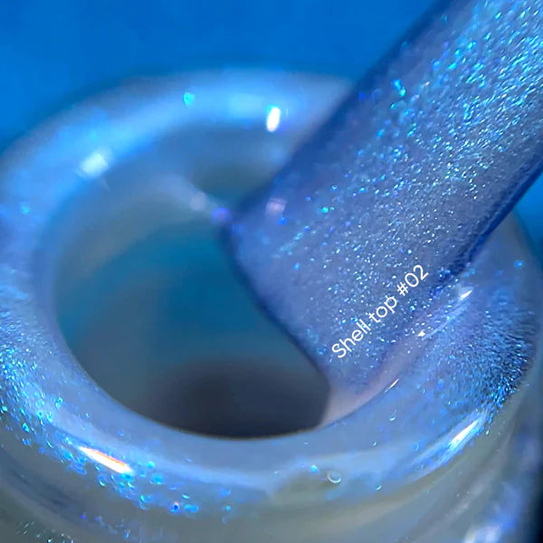 NAILSOFTHENIGHT Shell top 02 - top perlado con un toque azul sin capa pegajosa, 10 ml