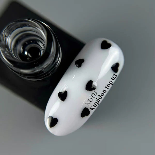 NAILSOFTHEDAY Kupidon top 03: top delicado para uñas con corazones negros intensos, sin capa pegajosa, 10 ml